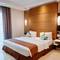Отель The Bellezza Suites