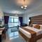 Отель Emirates Grand Hotel