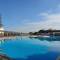 Отель Apollonia Beach Resort & Spa