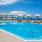 Отель Ramada by Wyndham Athens Club Attica Riviera
