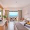 Отель Porto Platanias Beach Resort