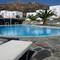 Отель Myconian Sunrise Relais & Chateaux Hotel