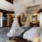 Отель Grand Balisani Suites