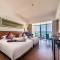 Отель Shengyi Holiday Villa Hotel & Suites