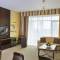 Отель TIME Oak Hotel & Suites