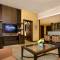Отель TIME Oak Hotel & Suites