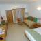 Отель Marie Laure Suites Apt