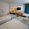 Отель Aurasia Deluxe Hotel