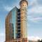 Отель Grand Millennium Al Wahda Abu Dhabi