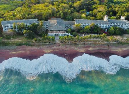 Отель Peacock Beach Resort and Spa