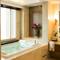 Отель The Grand Fourwings Convention Hotel