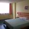 Отель Qingdao Guoren Hotel