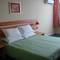 Отель Qingdao Guoren Hotel
