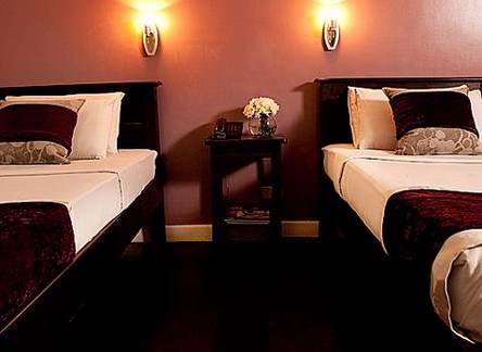 Отель Legaspi Suites