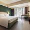 Отель Swiss-Belhotel Rainforest