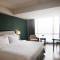 Отель Swiss-Belhotel Rainforest