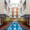 Отель The Sun Hotel & Spa