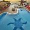 Отель Aleria Belport Beach Hotel