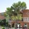 Отель Aleria Belport Beach Hotel