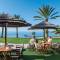 Отель Constantinou Bros Athena Beach
