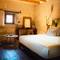 Отель Millstone Cave Suites Hotel