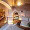 Отель Millstone Cave Suites Hotel