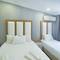 Отель La Pazza Suites