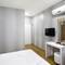 Отель La Pazza Suites