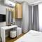 Отель La Pazza Suites