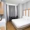 Отель La Pazza Suites