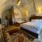 Отель Avanos Suites