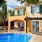 Отель Thea's Villa