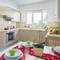 Отель Omerou Apartment