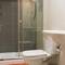 Отель Eden Beach Apartment 207