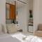 Отель Bluetopia Suites