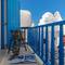 Отель Bluetopia Suites
