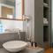 Отель Bluetopia Suites