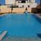 Отель Mythos Beach Hotel Apartments