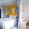 Отель Recenta Suite Phuket Suanluang