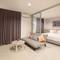 Отель Recenta Suite Phuket Suanluang