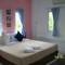 Отель The Leaf Guesthouse