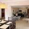 Отель Prime Homes La Paz Holiday Home