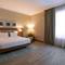 Отель Hilton Garden Inn Dubai Al Muraqabat