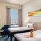 Отель Ibis Styles Dragon Mart Dubai