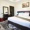 Отель Travellers Hotel Apartment
