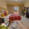 Отель Parkside Suites - Discovery Gardens