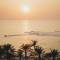 Отель Occidental Sharjah Grand
