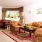 Отель Green Mubazzarah Chalets