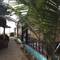Отель Sandy Feet Beach Garden