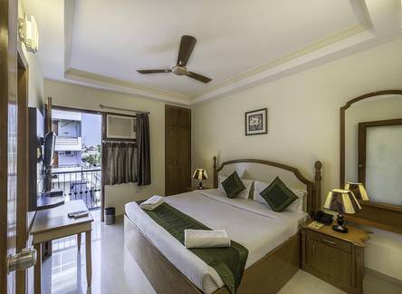 Отель Treebo WoodsVilla Suites